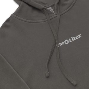 Pigment-dyed black hoodie featuring The Other logo